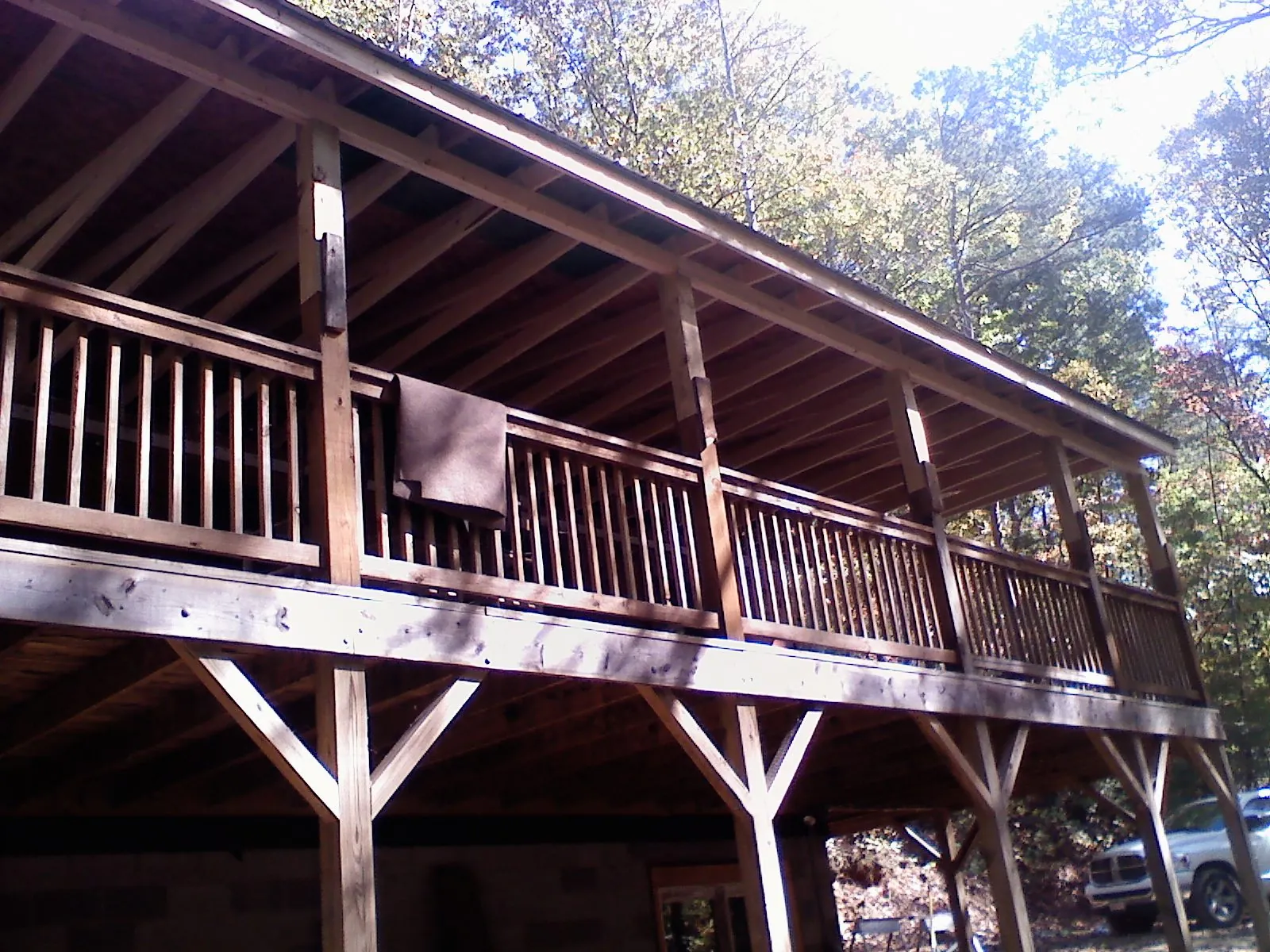 Timber framing under a new elevated porch and deck — Roof Leak Repair in Moundsville by Roofing Brothers
